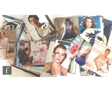 A large collection of 8x10 film and portrait stills including X Men, Kill Bill, Friends, Pirates of the Caribbean, Harry Pott