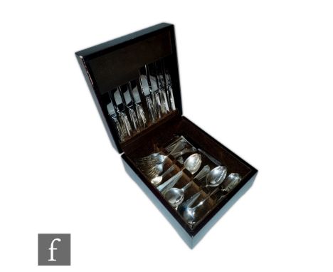 A cased hallmarked silver canteen of cutlery for eight place settings to include dinner knives and forks, dessert knives, for