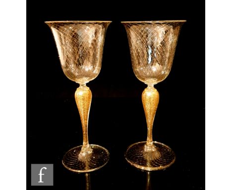 A pair of later 20th Century Venetian wine glasses by Vecchia Murano with a round funnel bowl with everted rim, internally de