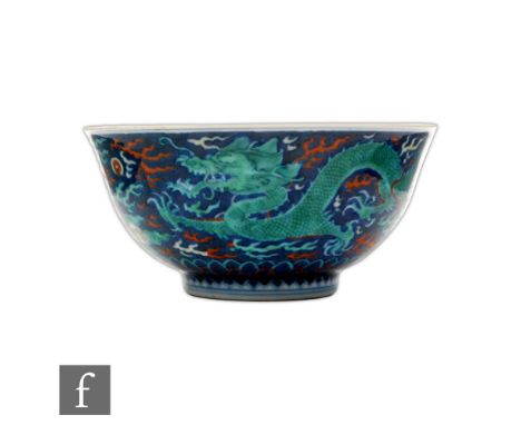 A Chinese enamelled 'Dragon' bowl, Qianlong seal mark (1736-95), but later, the 'U' form bowl rising from a low footing, the 