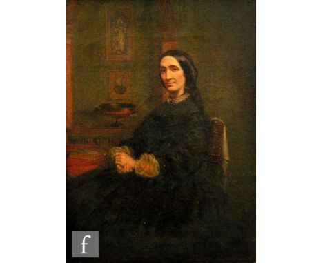 ENGLISH SCHOOL (LATE 19TH CENTURY) - Portrait of a lady, said to be Mrs Thomas Holroyd sitting at a table, half length, oil o