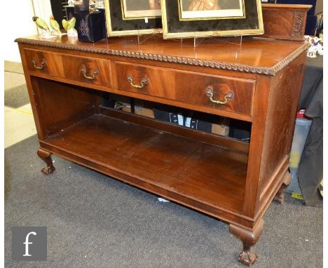 An Edwardian two tier mahogany buffet with gadrooned edge over two drawers on ball and claw feet, height 102cm x depth 55cm x