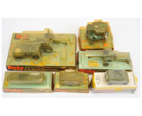 Dinky military group of to include - (1) 601 Austin Para-Moke with plastic cage and parachute, (2) 615 "US" Jeep with 105mm H