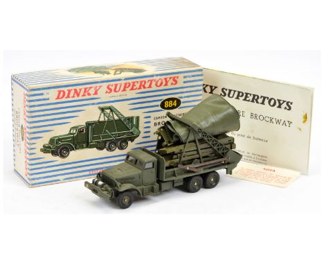 French Dinky 884 Brockway - drab green including concave hubs, with correct load - Excellent (does have some rusting to bare 
