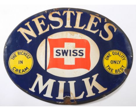 An oval enamel advertising sign for 'Nestles Swiss Milk':, white , blue, yellow and red enamels,  61cm x82cm.