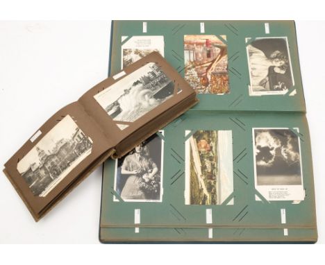 An Edwardian postcard album containing GB topographical, portrait and humorous cards:, together with a later smaller album  o