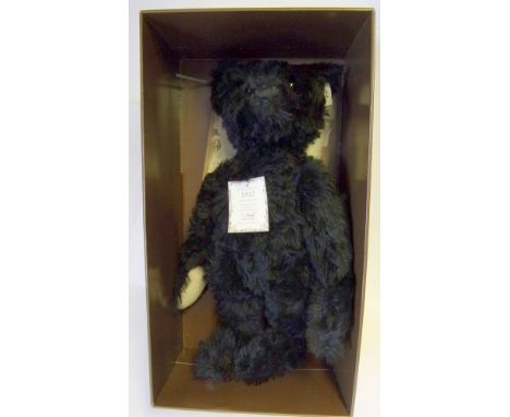 A Steiff 'British Collector's 1912 Replica Teddy Bear' Ltd. Ed: in black plush, 49cm. high, boxed.