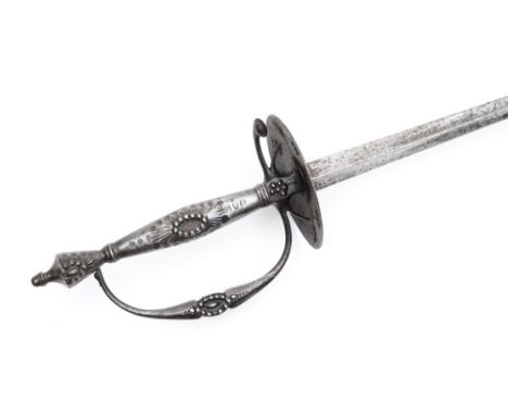 An 18th century steel handled small sword:, the triangular cross section blade with engraved militaria and compass decoration