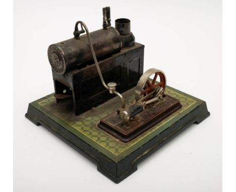 An early 20th century tinplate steam engine by Bing, Germany, together with a collection of wooden building blocks:, the stat
