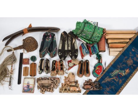 A collection of early 20th century Chinese textiles, shoes, fly whisk and three soapstone carvings relating to Owen Stevenson