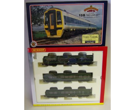 Hornby, a Class 101 Diesel Multiple Unit (3-car) in BR green livery: together with a Bachmann 158 Two-car set in Regional Rai