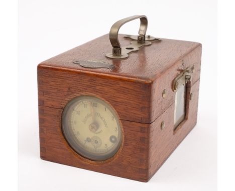 An oak cased 19 bird pigeon racing clock by Jundes-Thuxor:, number 4325.
