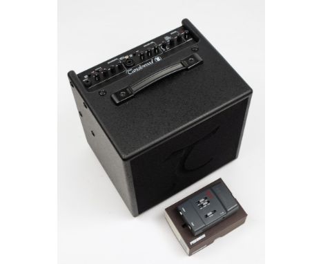 A Tanglewood T6 acoustic amplifier and AKG microphone:.