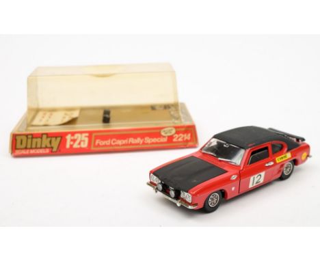 A Dinky (1/24th scale) 2214 Ford Capri Rally Special:, red body, black interior, roof and bonnet, chrome trim, card base with