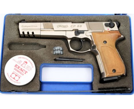 A Walther CP.88 competition air pistol in .177 calibre nickel finish: with walnut grips and two spare Rotary magazines, conta