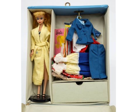 A Barbie 'Doll Case' containing a 'Fashion Model Barbie' by Mattel, circa 1959:, the case also containing a collection of var