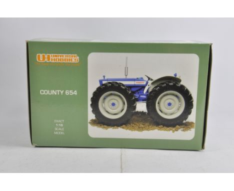 Universal Hobbies 1/16 County 654 Tractor. M in Box (Box has some smoke staining).
