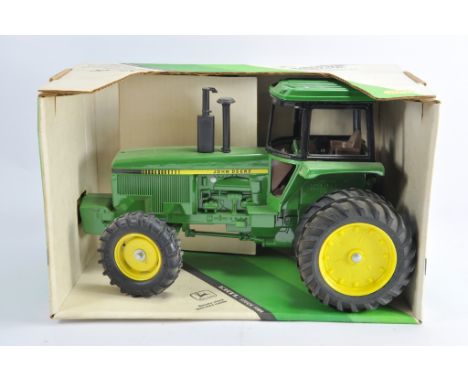 Ertl 1/16 John Deere 4850 Tractor. NM in VG to E Box.