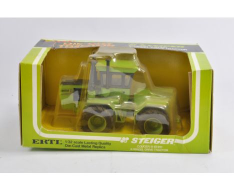 Ertl 1/32 Steiger Cougar Tractor. NM in VG to E  Box.