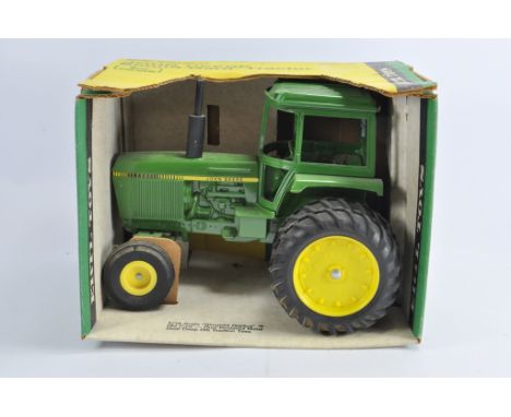 Ertl 1/16 John Deere Sound Guard Tractor. NM in VG to E Box.