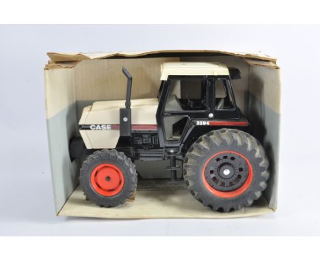 Ertl 1/16 Case 3294 Tractor. NM in VG to E Box.