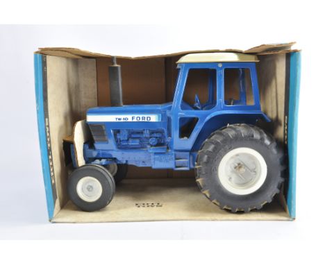 Ertl 1/12 Ford TW10 Tractor. NM in VG to E Box.