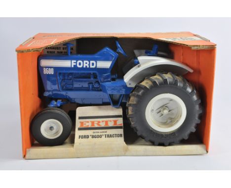 Ertl 1/12 Ford 8600 Tractor. NM in VG to E Box.