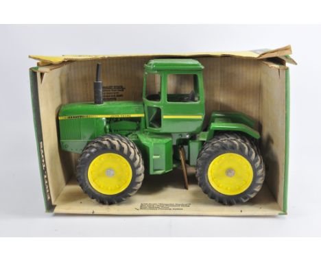 Ertl 1/16 John Deere 8650 Tractor with Duals. NM in VG to E Box.