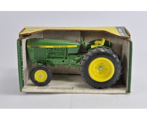 Ertl 1/16 John Deere Utility Tractor. NM in VG to E Box.
