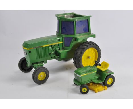 Ertl Loose Tractor Models including 1/16 RC John Deere and one other. F. (2)