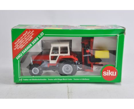 Siku 1/32 Massey Ferguson 3050 Tractor with Block Cutter. M in Box.