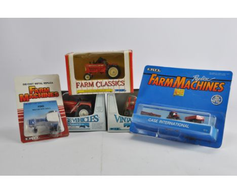 Group of smaller scale Farm Toy Tractor Models including Ertl Vintage Series and Farm Classics. Generally NM to M in Boxes. (