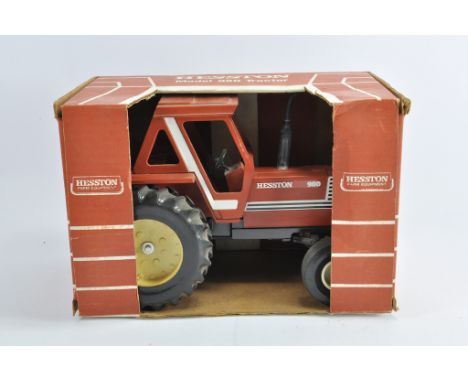 Scale Models 1/16 Hesston 980 Tractor. NM in VG to E Box.