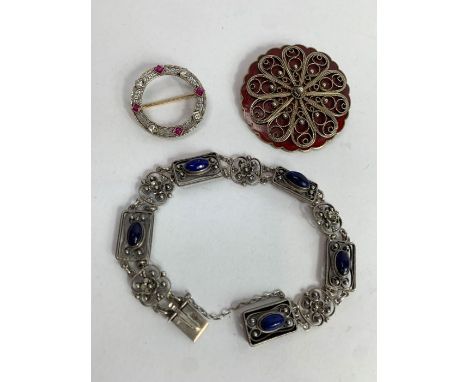 A continental lapis lazuli set bracelet, stamped ‘800’; an enamel and silver Norwegian brooch by Ivar T Holth, 4.2 cm diamete