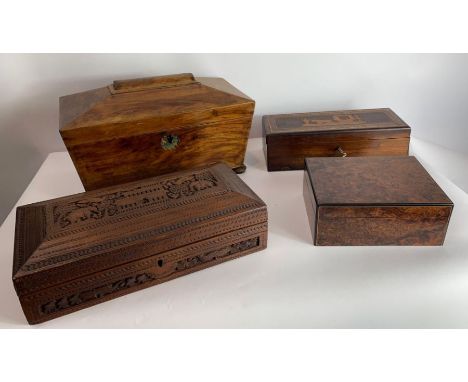 A Victorian walnut sarcophagus tea caddy, the hinged lid opening to two lidded compartments and central later glass liner, on