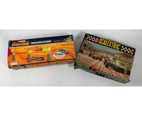 A vintage boxed Corgi Rockets 'Grand Canyon Speedcircuit' together with a vintage boxed Scalextric set 50 (no cars)