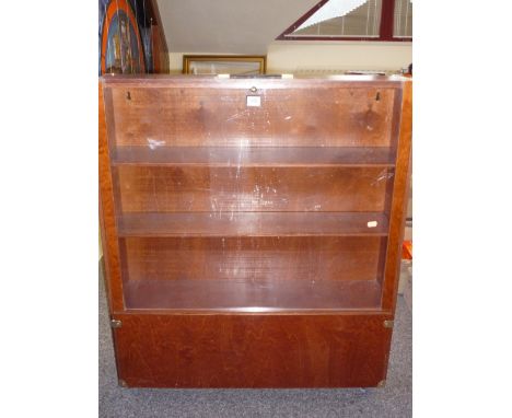 A WOODEN THREE SHELF PORTABLE DISPLAY CASE, with detachable wheeled storage unit to bottom, height approximately 95cm, width 