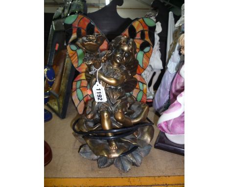 A TIFFANY STYLE FLOWER FAIRY LAMP