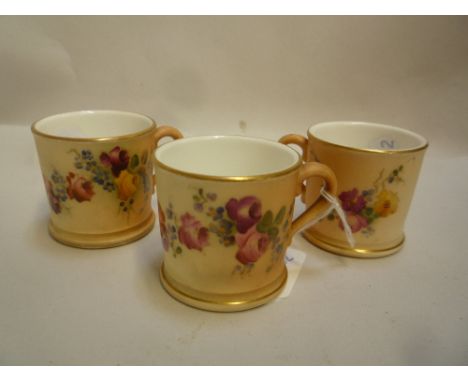 THREE ROYAL WORCESTER BLUSH IVORY MINIATURE TANKARDS, circa 1920