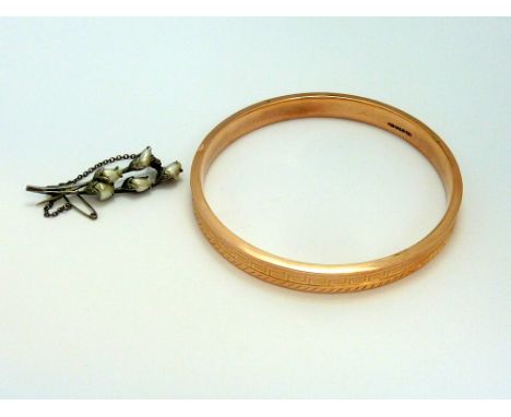 TWO ITEMS OF JEWELLERY, the first a rose gold bangle with Greek key design, from Birmingham makers Smith and Pepper together 