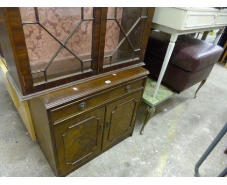 A MAHOGANY TWO DOOR CUPBOARD, coffee table, an oak armchair and a pouffe (4)