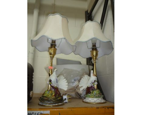 A PAIR OF CAPODIMONTE LAMP BASES, mounted with Doves (with shades)