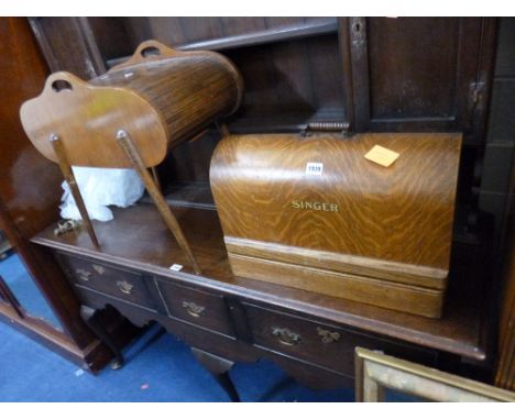 A SINGER MANUAL SEWING MACHINE, and a sewing box with contents (2)