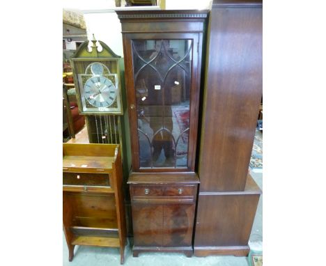 A SLIM MODERN MAHOGANY GLAZED SINGLE DOOR CABINET, with cupboard base, single drawer and a pull out shelf