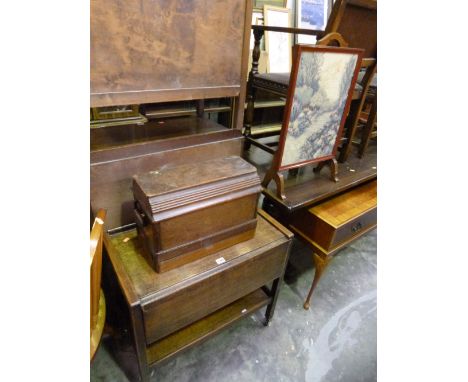 AN OAK TEA TROLLEY, cased singer sewing machine and a firescreen (3)