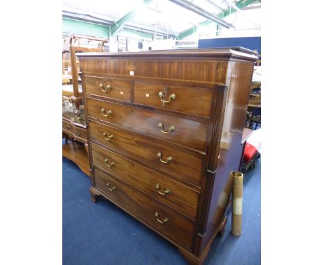 A LARGE 19TH CENTURY MAHOGANY AND WALNUT INLAID CHEST, of two short and four long drawers on ogee bracket feet supports (two 