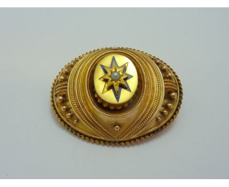 A MEMORIAL BROOCH, with split pearl to the blue enamel star with further graduated borders, to reverse also pendant hook, sta