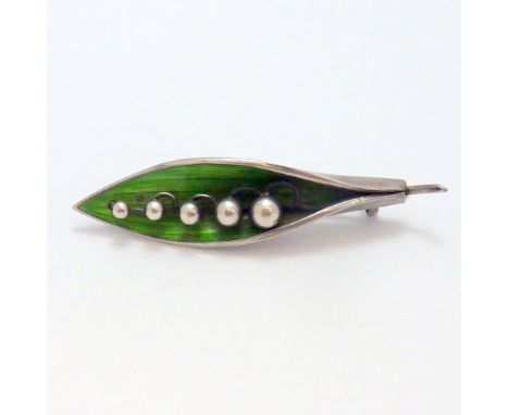 A SILVER BROOCH, of leaf shape with green enamel detail, depicting a Lily-of-the-valley, hallmarks for Birmingham, makers Art