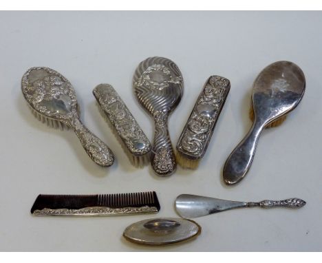 A MIXED LOT OF SILVER DRESSING TABLE ACCESSORIES, Victorian to Edwardian, including four brushes, a comb, hand mirror, shoe h