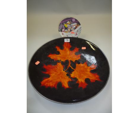 A POOLE POTTERY 'FOREST FLAME' CHARGER, reverse stamped, and another Poole dish (2)